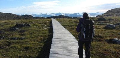 A hiker on the walingpath between Ilulissat and Sermermiut